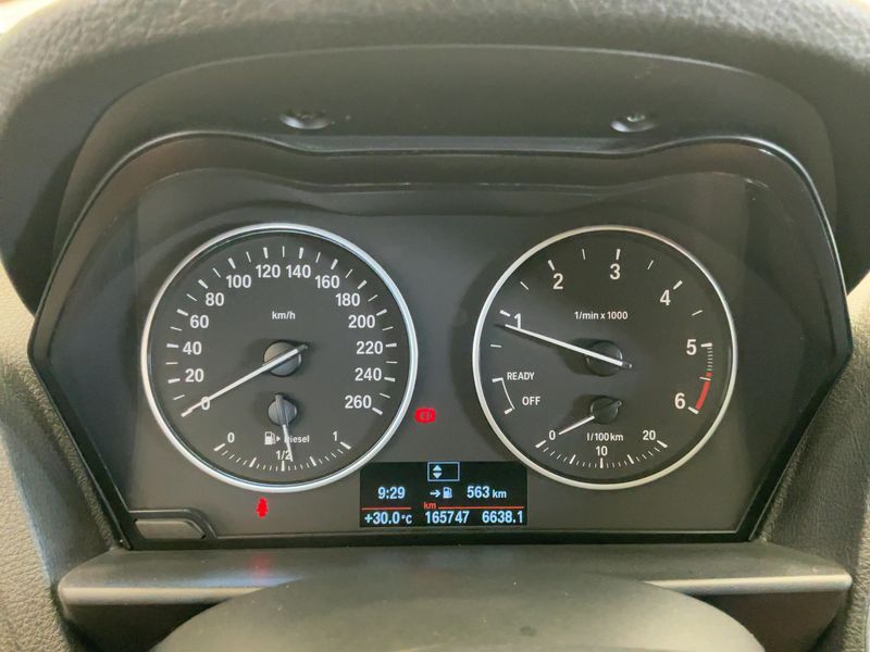 BMW 1er 118d xDrive Advantage 2015 – снимка 19