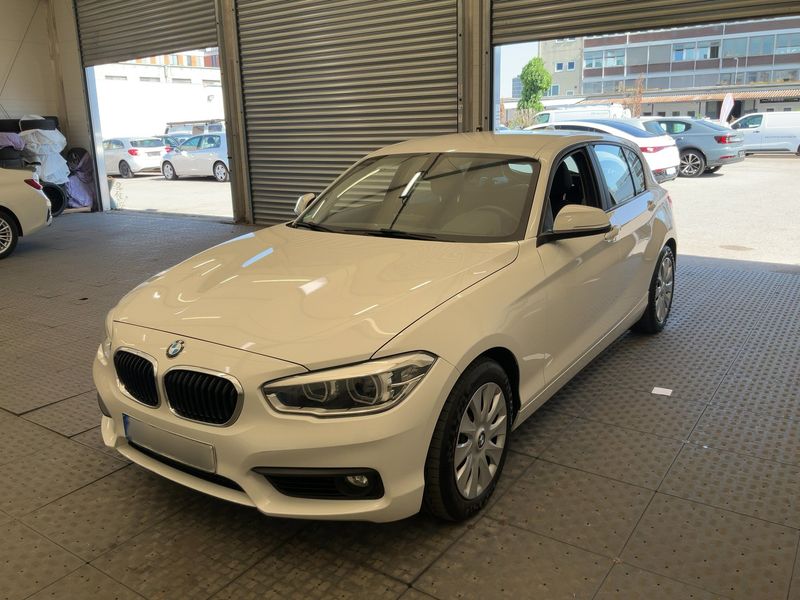 BMW 1er 118d xDrive Advantage 2015 – снимка 1