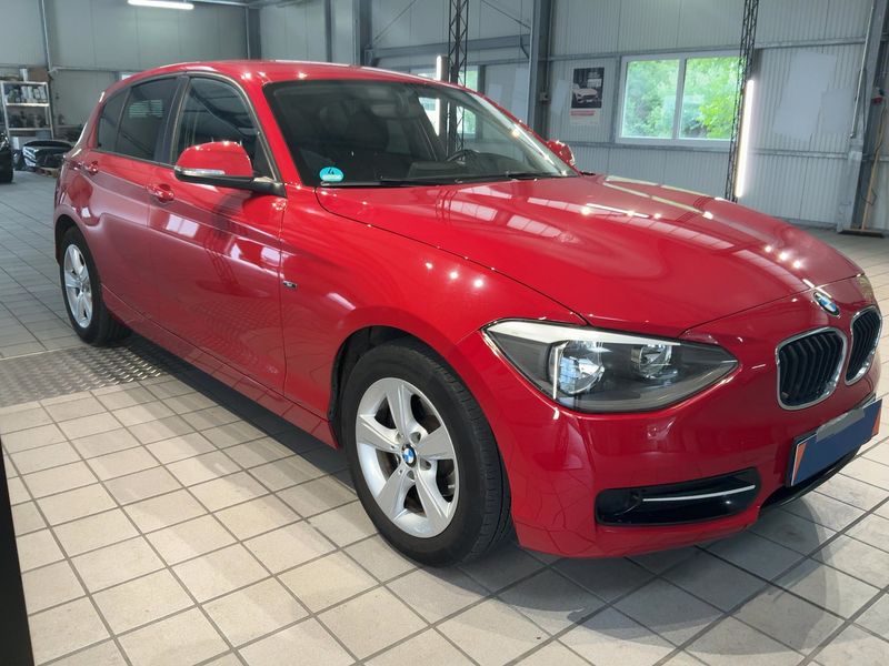 BMW 1er 114i 2014 – снимка 12