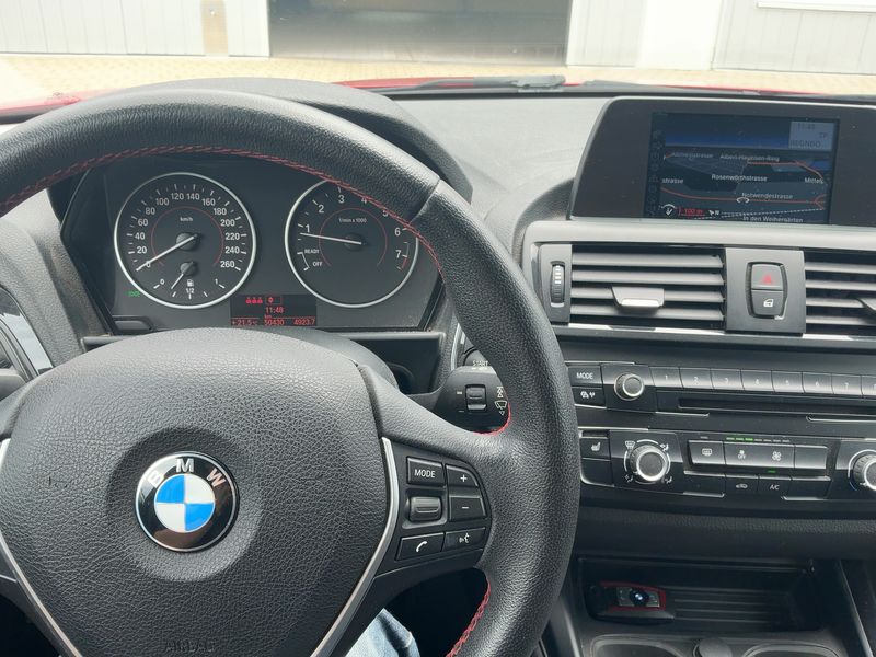 BMW 1er 114i 2014 – снимка 18
