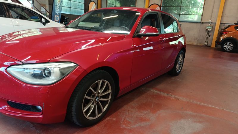 BMW 1er 118d xDrive Lounge 2014 – снимка 2