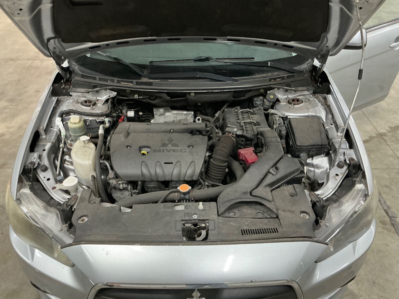 Mitsubishi Lancer 1.8 DOHC Invite 2010 – снимка на щета